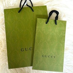 Gucci 2 pack of shopping bag totes. You get 2 sizes. Authentic